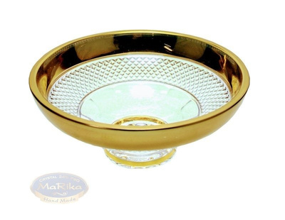 Crystal golden bowl on the foot.